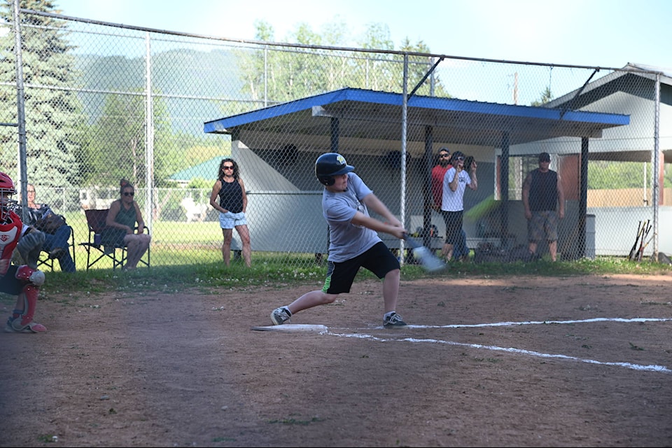 Hunter Atwater takes a swing and it’s a hit! The Clearwater U10 minor ball player hit a home run during a game against the Barriere team Friday, June 18 at the Capostinsky Park diamonds. (Stephanie Hagenaars / Clearwater Times)