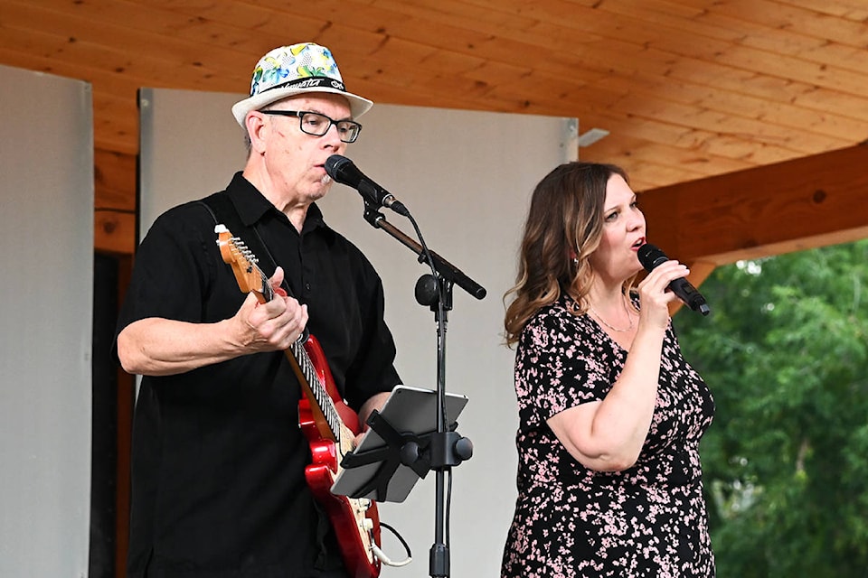 Sabrina Weeks and Mike Hilliard from Kamloops entertained the crowd with original tunes and cover songs during the opening night of the Wells Gray Lively Arts summer stage. (Stephanie Hagenaars / Clearwater Times)