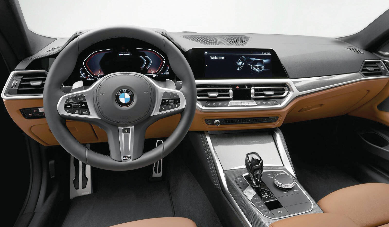 The dash has very few buttons or switches. Many functions are rooted in the infotainment screen while others are located on the steering wheel. PHOTO: BMW