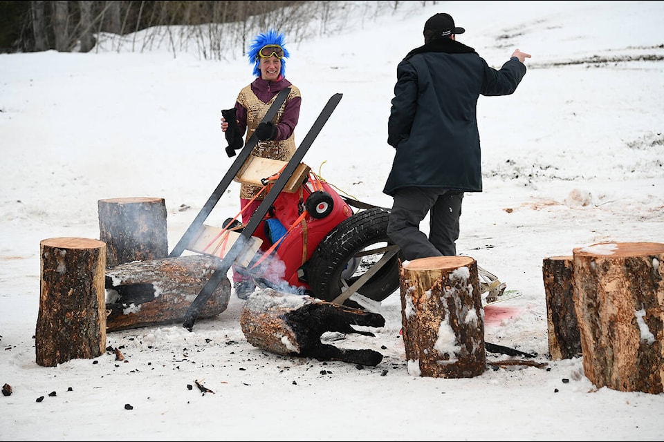 Kris and Jordan Olson check out the wreckage after their dummy skier slammed into a couple of logs at the bottom of the dummy ski races during Sunday Funday at the Clearwater ski hill. (Stephanie Hagenaars/surgeryitaly)