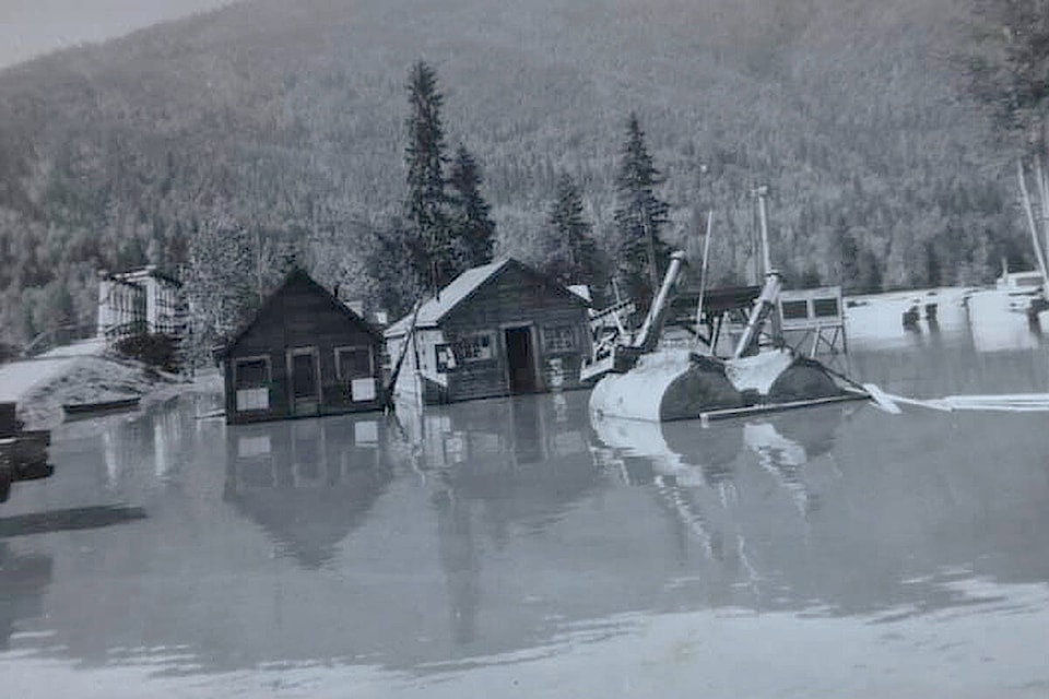 1948 flood in the Clearwater flats. Pictured is the CTP planer mill yard. (Courtesy of Len Sollows)