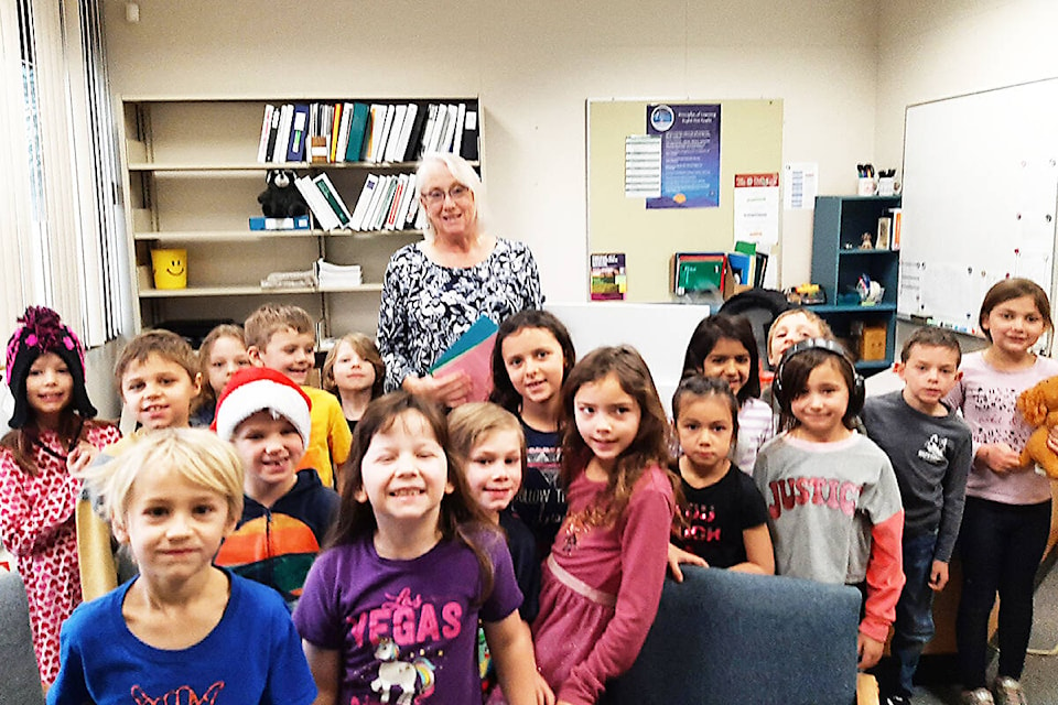 Lori Bradstock with students on her last day as principal at Raft River Elementary on Jan. 13, 2023. (Photo/Penny Johnston).