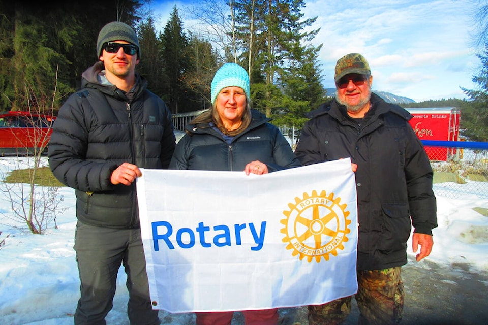 Winners of the Rotary Icebreaker Fishing Derby include: Third place winner Andrew Mann (from left) with a 33.2 cm fish, second place winner Kathy Braaten with a 47cm fish and first place winner Bill Cederholm with a 49 cm fish. (Abbey Bates photo)
