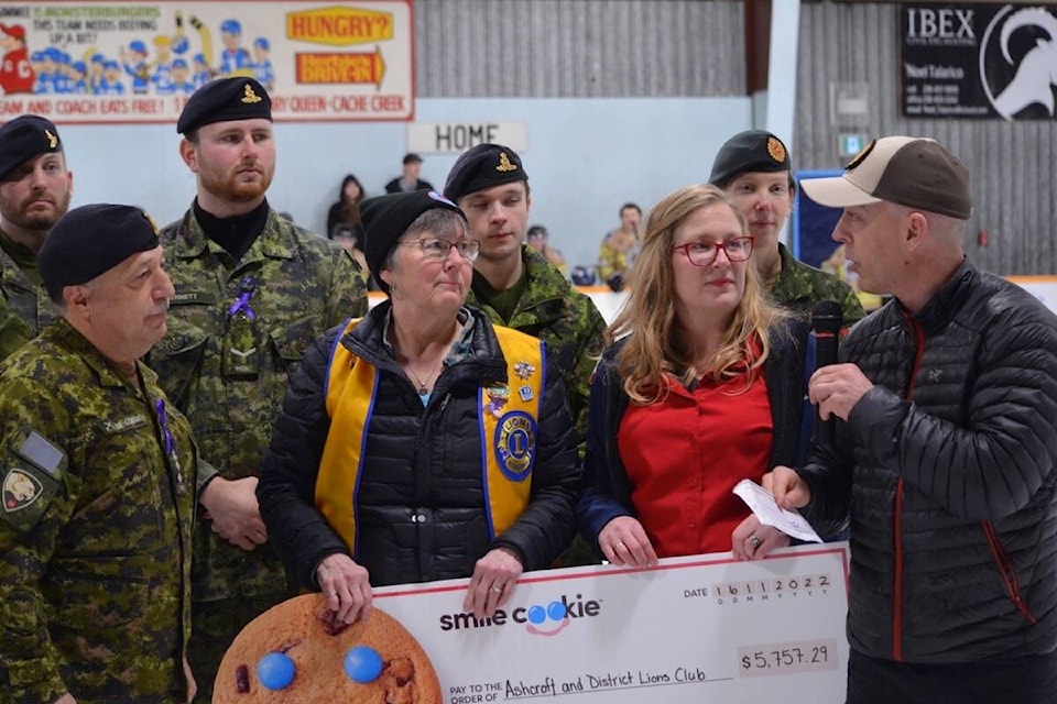 (front row, from l): Hon. Col Al De Genova, founder and president of the Honour House Society; Ashcroft and District Lions Club president Sue Peters; Ashcroft Travel Centre Tim Hortons manager Starla Dixon; and Rob Farrer, director of the National Police Federation’s Benevloent Foundation at the start of the third Guns and Hoses charity hockey game on Jan. 21. (Photo credit: Barbara Roden)