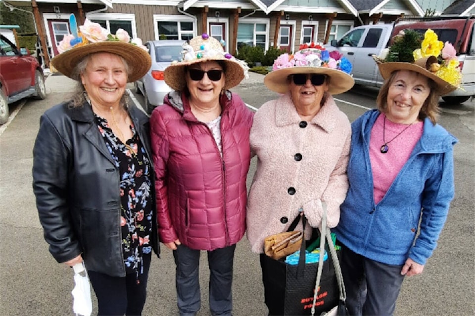 Beta Sigma Phi members visiting Evergreen Acres Seniors residential area in Clearwater to deliver Easter treats in 2024. Seen here (from left to right): Niki McMillan, Luci Doull, Marnie Burnell and Joan Slingsby delivering Easter bags with treats inside. 