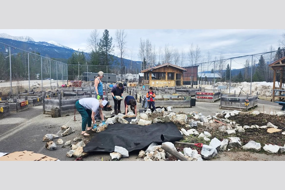 Volunteers and garden enthusiasts were sprucing up the Blue River Community Garden on April 6 getting ready for spring planting.  