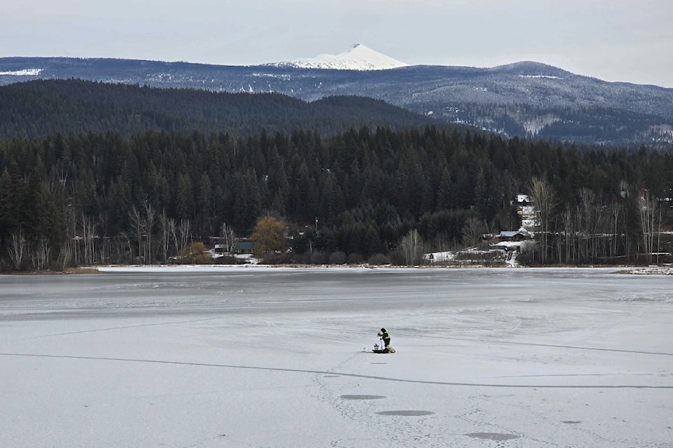 First ice fishing on Dutch Lake in Clearwater, January 20 with Raft Peak in the foreground. 