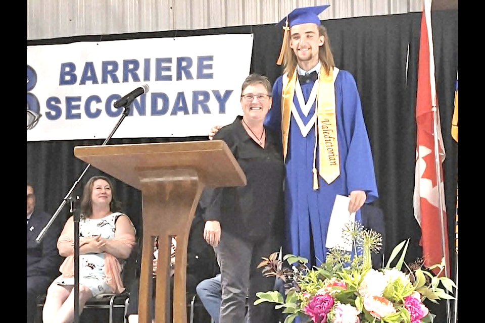 The North Thompson Communities Foundation bursary was presented to BSS Grad. Jeff Fennell (R) by NTCF chair Louise Lodge (L) during grad on June 13, 2025 in Barriere. 