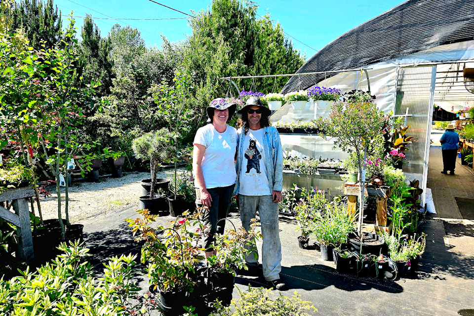 Andrea and Jeff Lamond, owners of Rooted by the River Nursery on Saturday June 7 in part of the redesigned garden centre.