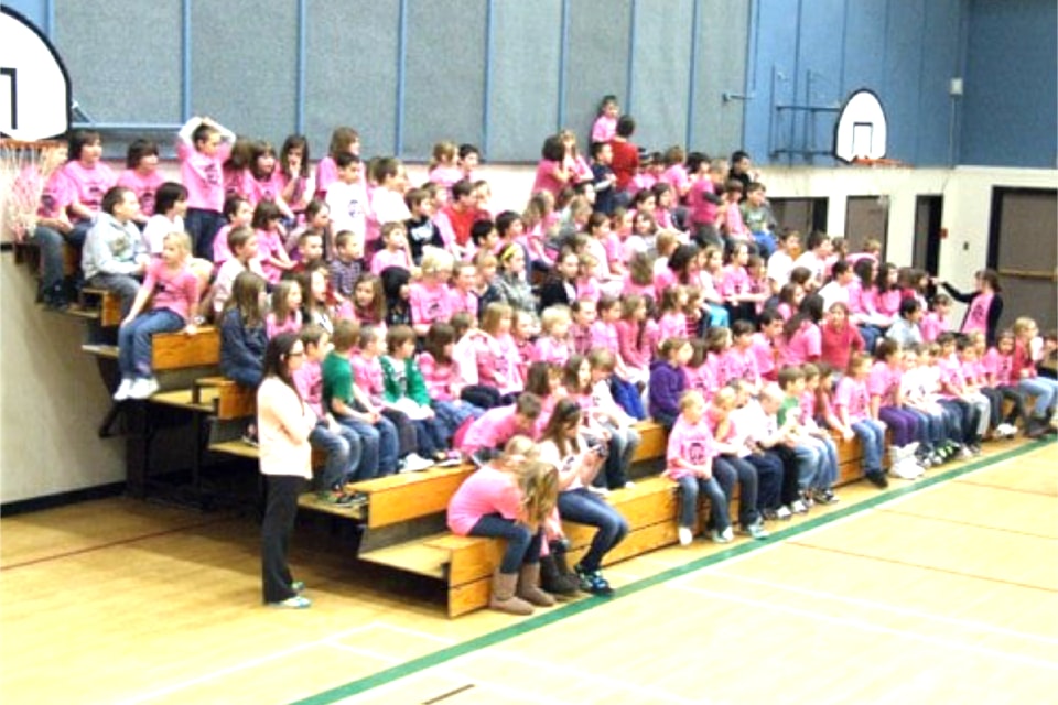 At noon, a student team competed in a floor hockey game against the RCMP in front of a noisy crowd of pink-shirted RRES supporters on Feb. 29, 2012.