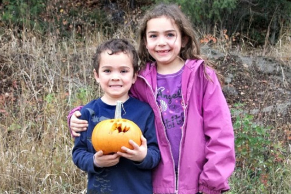 Youngsters check out a handcarved jack-o-lantern as Clearwater and area get ready for Halloween. Jaden Phillips, age six, and his sister, Kiah Phillips, age seven, hold a jack-o-lantern that Jaden made for Halloween in 2012. 

