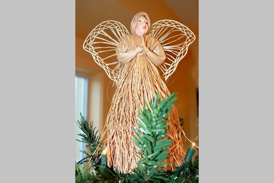 From our archives - Dec. 2013: The Angel Hospice Tree (sometimes called the Memory Tree) is waiting at the Barriere Library where area residents can write the names of their departed loved ones onto an angel to be hung on the tree.