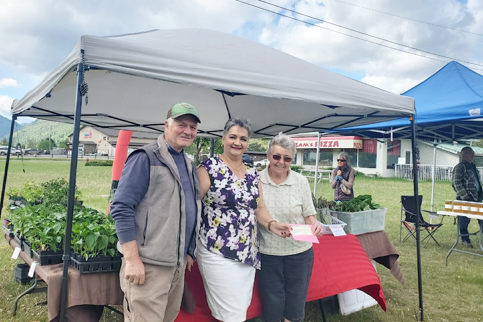 On Thursday May 8, 2025 the Barriere Farmers' Market (BFM), presented a $1,500 cheque to Jane Milburn of the Barriere & District Hospice Society (BDHS). Seen here (From L - R): Jerrard  and Donna Kay Brown of the BFM presenting to Jane Milburn representing BDHS.   