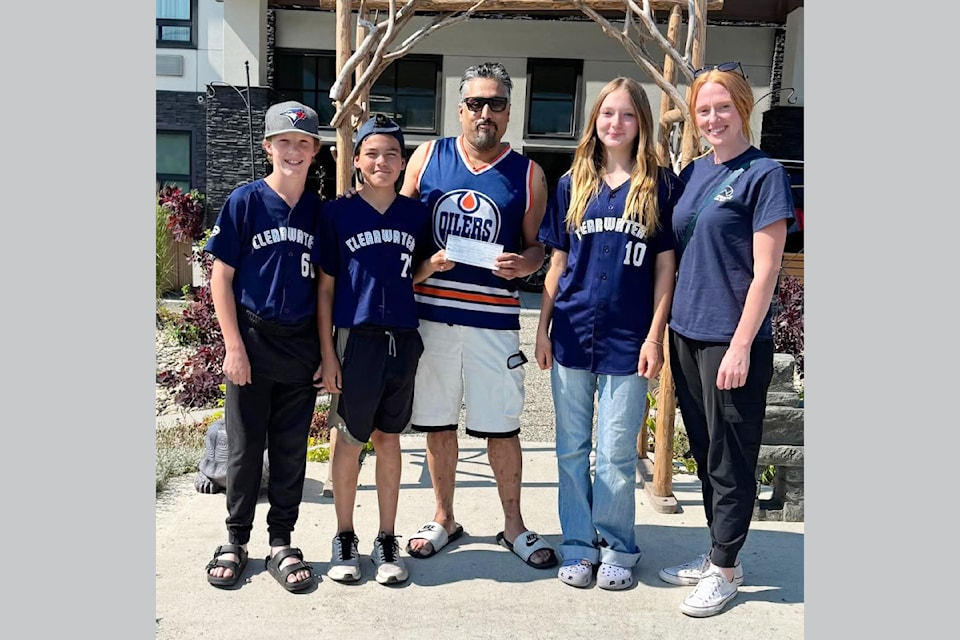 Clearwater Minor Ball received a sponsorship donation from A.J. Bachhal, (centre) owner of the Best Western Plus and Quality Inn on June 9, 2025. (From L - R): Max Osborne, Eric Jeck, AJ Bachhal,  Jolee Chenier and Siarah Arndt of the CMB.
