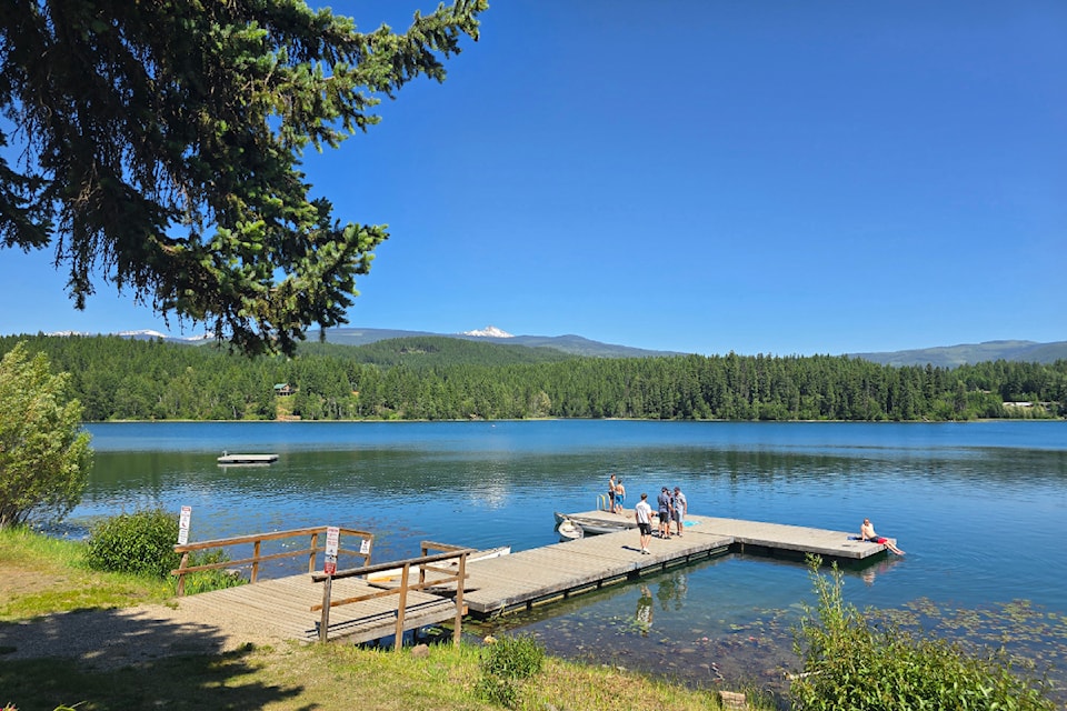 Sparkling Dutch Lake Resort view looking towards Raft Peak and the Trophy Mountain range. June 7, 2025.