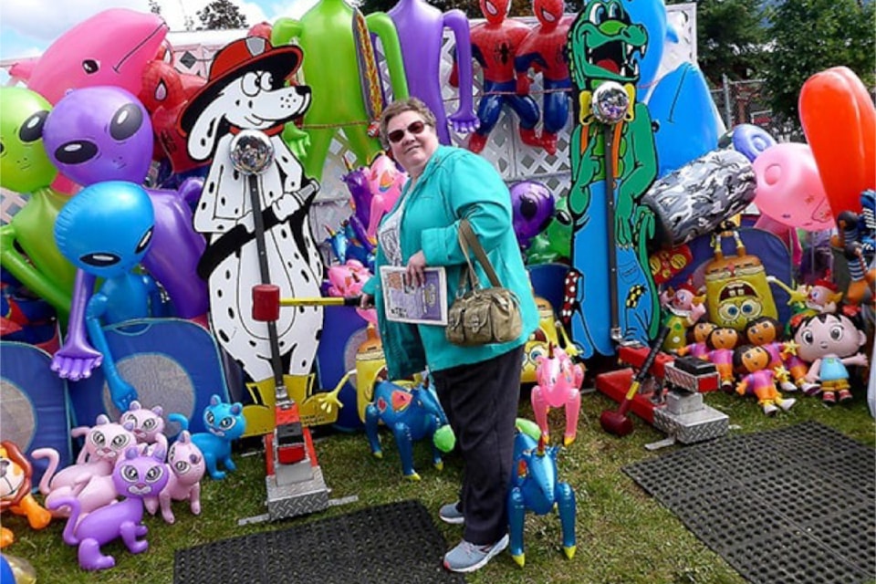 Vickie Cook checks out a ring-the-bell game at the North Thompson Fall Fair and Rodeo during the Labour Day long weekend in Barriere.

She was one of several members of Wells Gray Country Seniors Society who took bus to the fair from Clearwater with the help of a grant from Wells Gray Community Forest Corp.