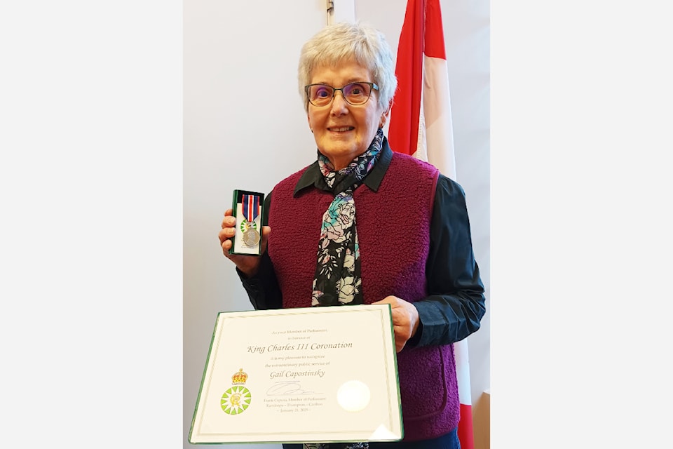 Dr. Helmcken Hospital Auxiliary member and long time community volunteer, Gail Capostinsky was presented with the King Charles III coronation medal at MP Frank Caputo's office in Kamloops on January 20, 2025. 