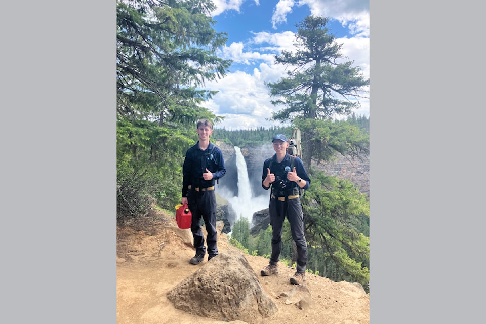 (From L - R): Wells Gray Trail Crew, Aidan and Ethan with Helmcken Falls in the background in July, 2025. 