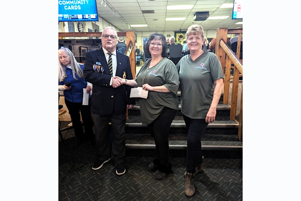 The Royal Canadian Legion #242 donated a cheque in the amount of $2881.25 to the North Thompson Activity Centre Society on Saturday Feb. 22 to support their youth programs. 
(From L - R): Legionaire, MaryAnn Shewchuk, Legionaire, Vern Buker, Judy Armstrong NTACS program manager and NTACS office manager, Mary Martin.