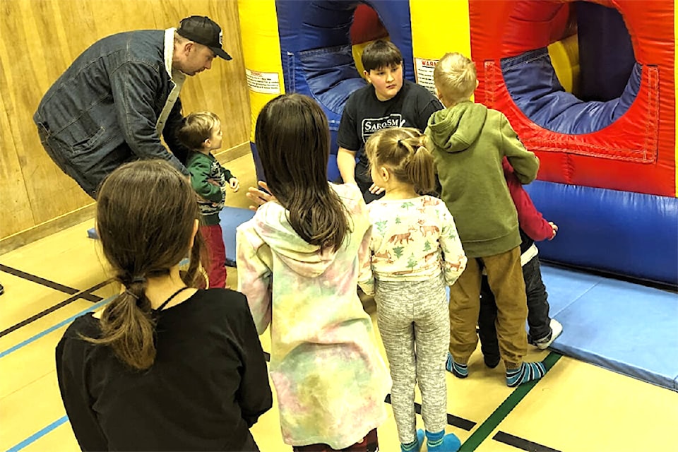 Kids were excited to have their turn in the bouncy castle set up at ‘The Ridge’ during Family Fun Night at ‘The Ridge’ during Family Day weekend on Feb. 18, 2024.