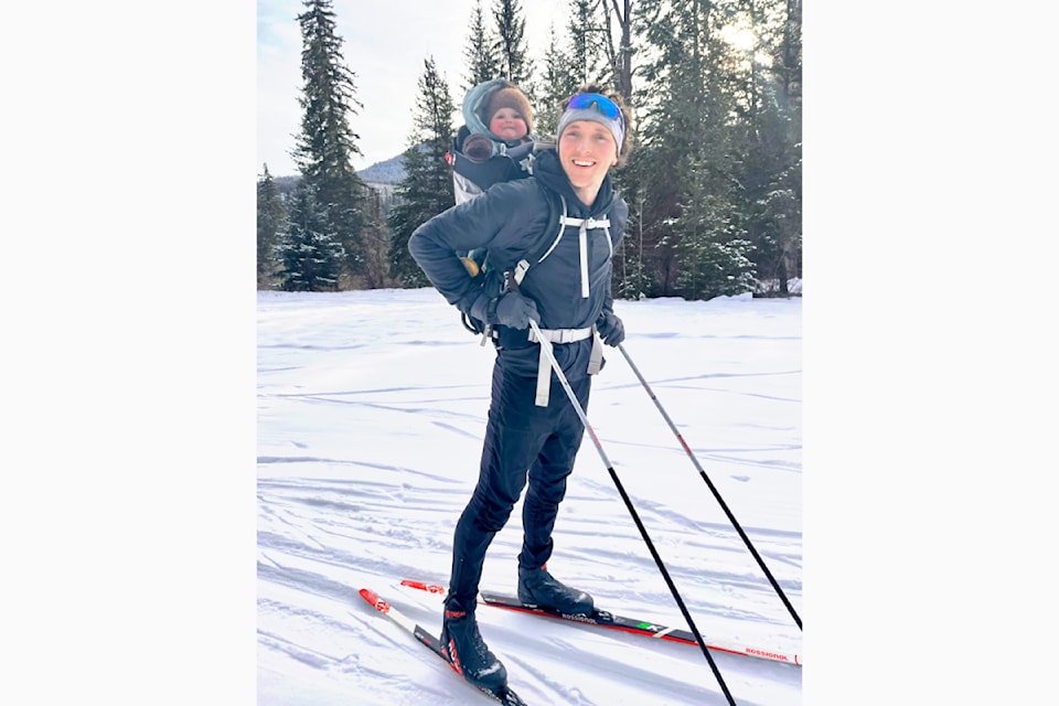 Jordan Rainer with his 8-month-old baby girl, Etta Jean, skiing at the Forks Trails on Tuesday, Jan. 28. 