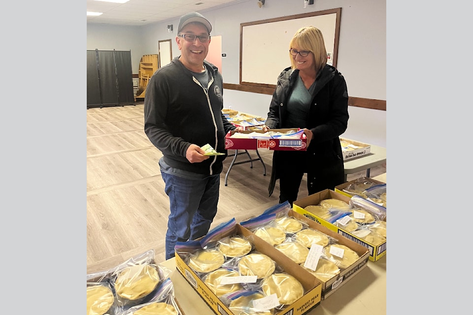 District of Barriere, mayor Rob Kerslake seen happily purchasing pies during the Barriere Legion #242 Ladies Auxiliary meat pie sale held on Saturday March 29. 