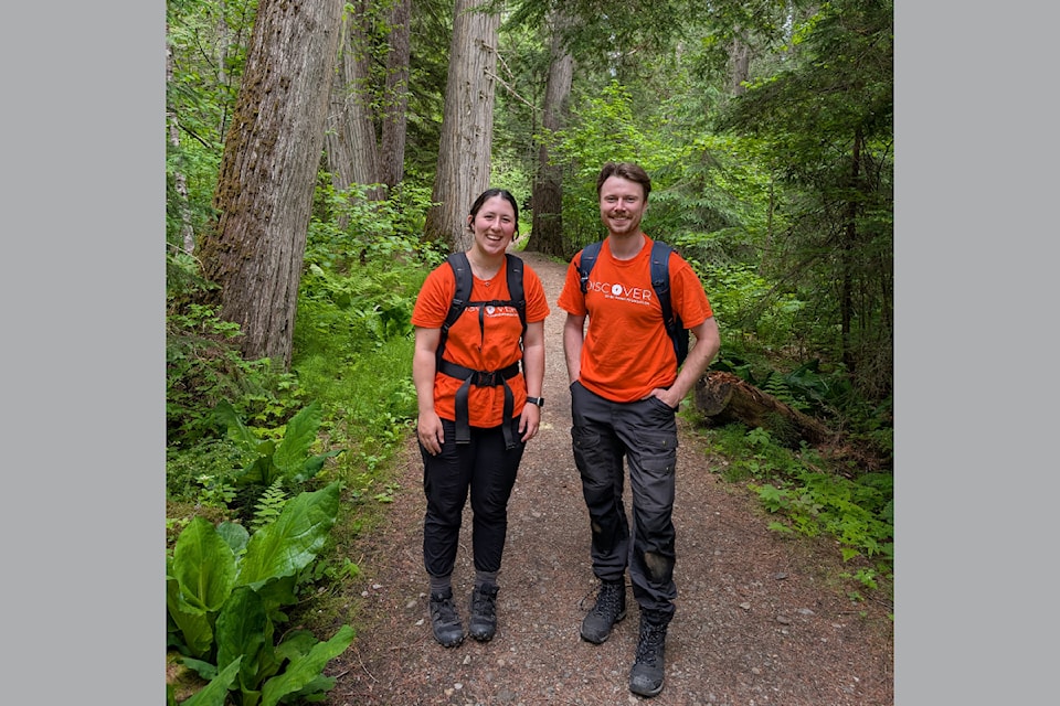 Kendall McKinnon (L) and Sam Dyck on Bailey’s Chute trail on June 6 on a Wells Gray walk about with Roland Neave. 