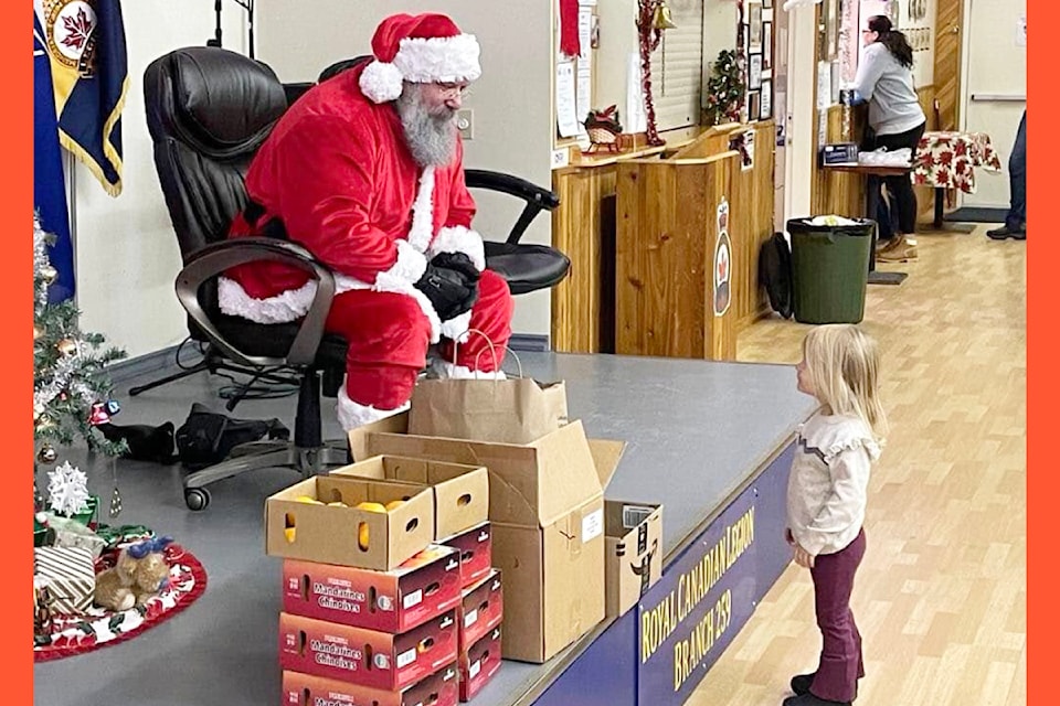 Santa was all ears listening to this little lady about her Christmas Wishes on Sunday Dec. 8 during the Breakfast with Santa at the legion in Clearwater. 