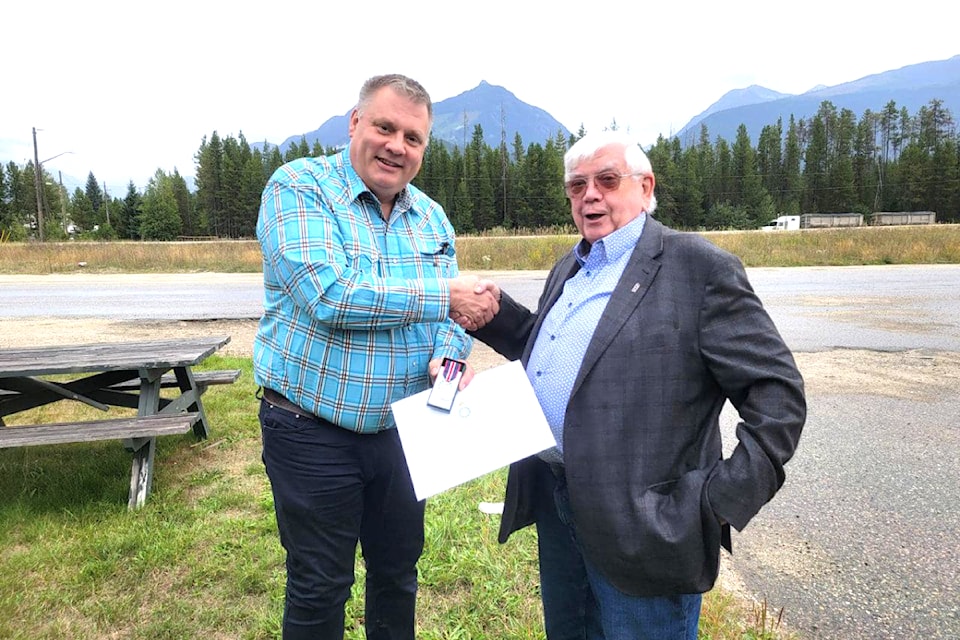 (From L to R): MLA Peter Milobar presents the King Charles III Coronation medal to Steve Quinn on Friday Sept. 13 to honour his ongoing contributions to the community of Blue River and the North Thompson Valley. 