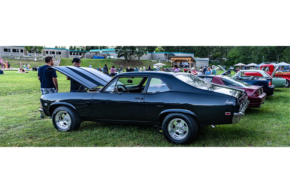 Ryan Mackenzie discussing cars at a recent Wells Gray Lively Arts event. Cruisin' Clearwater hosts a full weekend featuring classic cars from Aug. 23 to 25. 