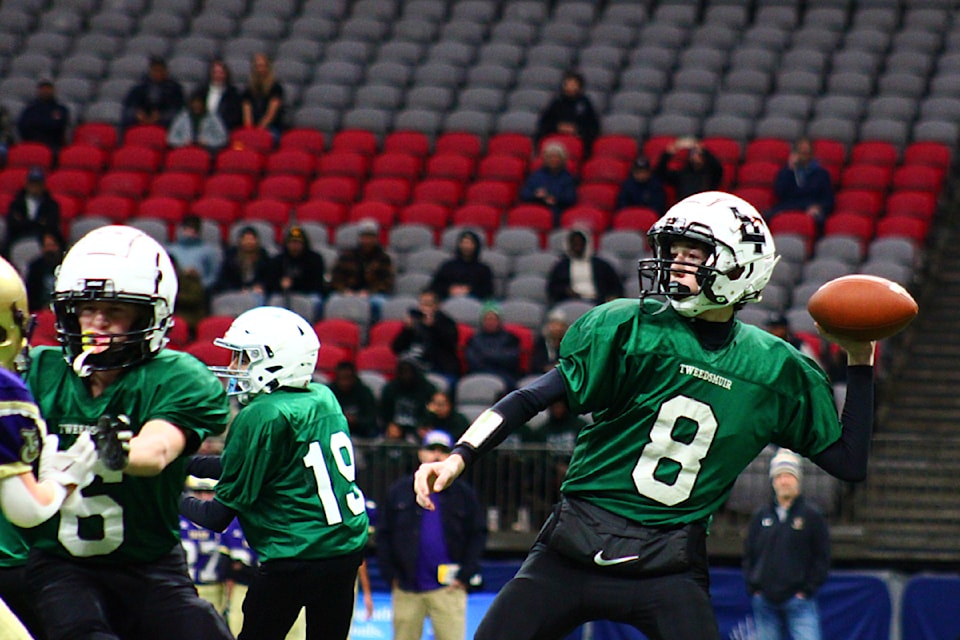 Quarterback Eli Brookshaw gets ready to throw the ball in second-half action of the Grade 8 championship final held at B.C. Place Nov. 23.