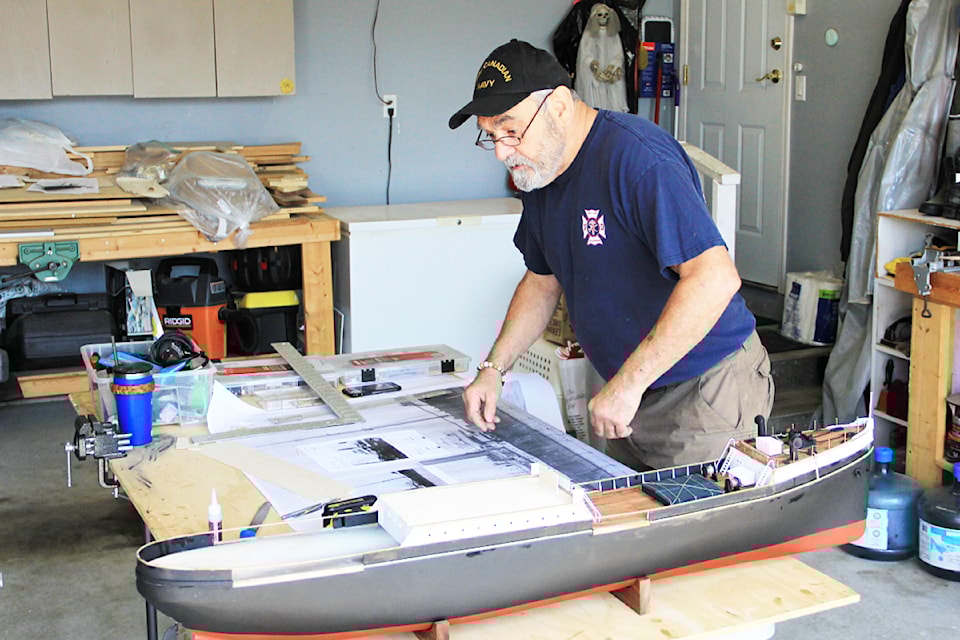 Yvon Lehoux works on a replica of the SS Komagata Maru. (Photo: Malin Jordan)