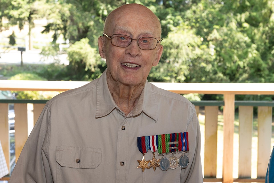 Richmond "Dick" Deck, 103, is seen just before being awarded the French “Legion of Honour” medal July 18.