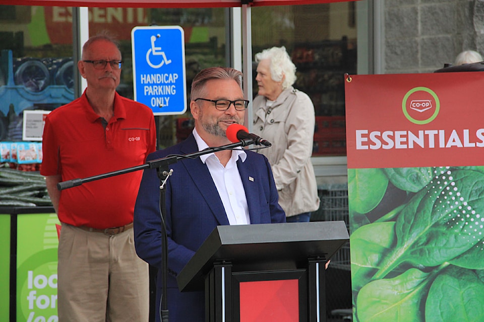 Jack Nicholson, Otter Co-op CEO, addresses those gathered ahead of the official opening of Co-op Essentials in Cloverdale.