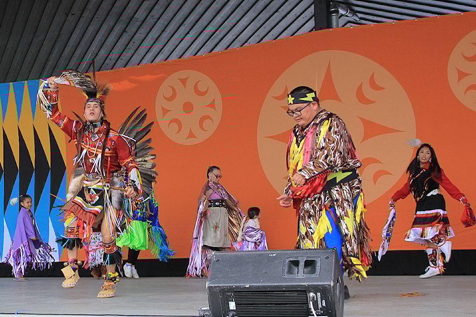 David Stewart (left) dances with One Nation Powwow Group at the National Indigenous Peoples Day celebration held June 21 on the Cloverdale Fairgrounds.