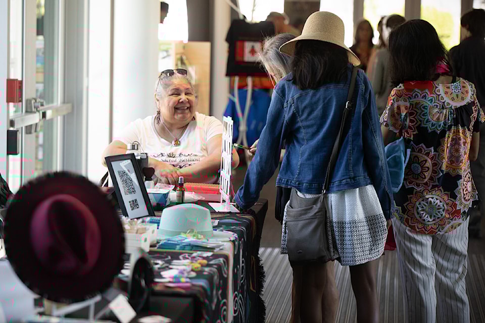 An Indigenous artist is seen at the Museum of Surrey during a previous event.