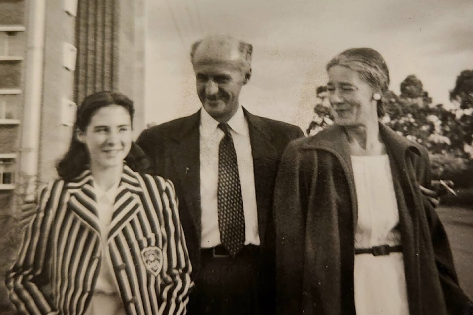 After journeying to South Africa for Christmas in 1954, Ursula Maxwell-Lewis is seen with her parents before she heads off to boarding school.