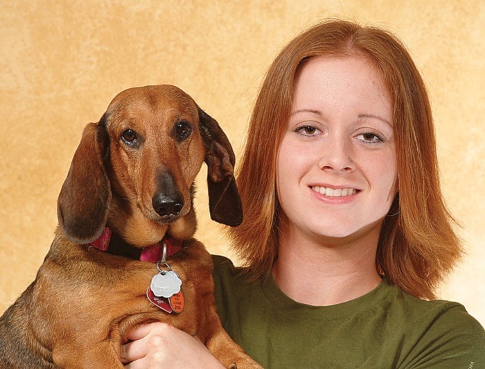 Animal activist Ashley Fruno with her dachshund Ginger, 7.