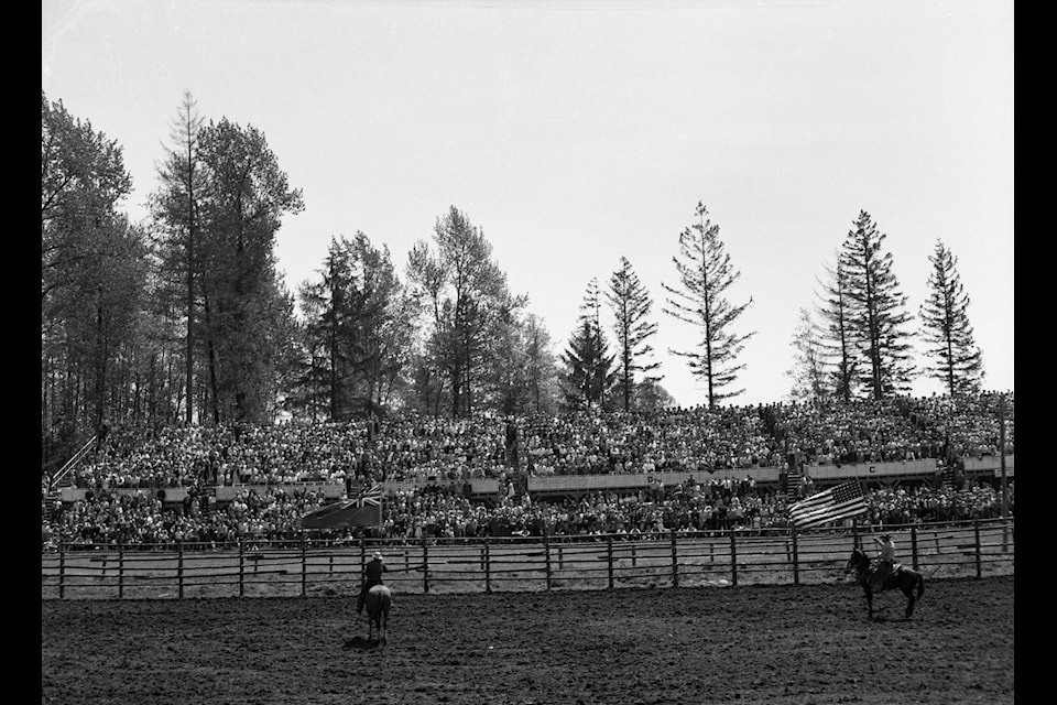 The grandstand on the Cloverdale Fairgrounds is seen during a rodeo circa 1950. (Image courtesy City of Surrey Archives, SM.87E) 