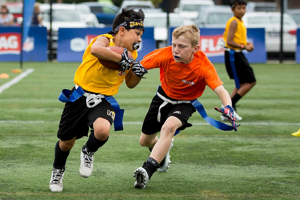 12522696_web1_2018.06.24-CFL-Flag-Football-HiRes_021