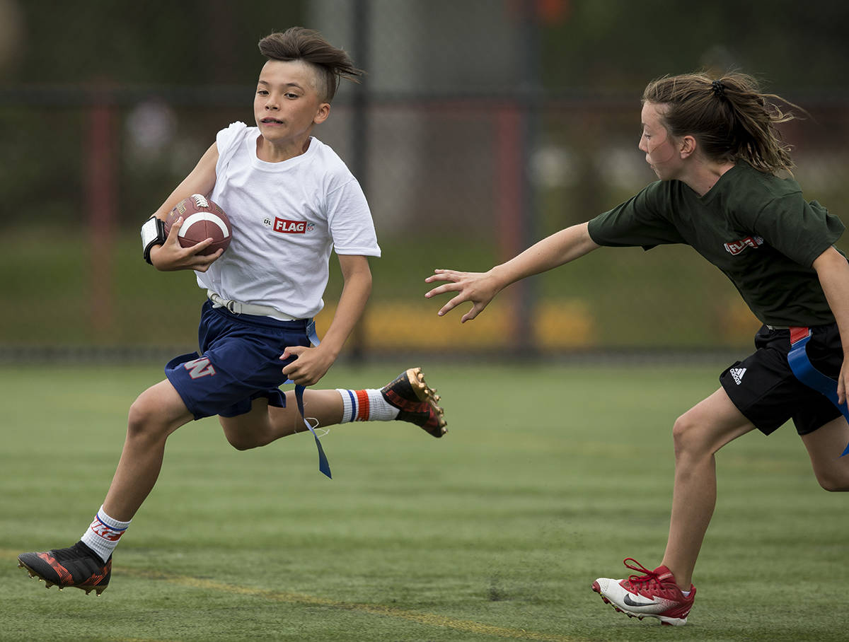 12522696_web1_2018.06.24-CFL-Flag-Football-HiRes_036