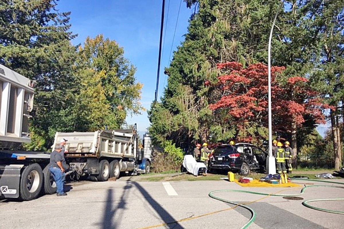 14038109_web1_181019-PAN-M-dump-truck-crash-28-164st-looking-North-contributed