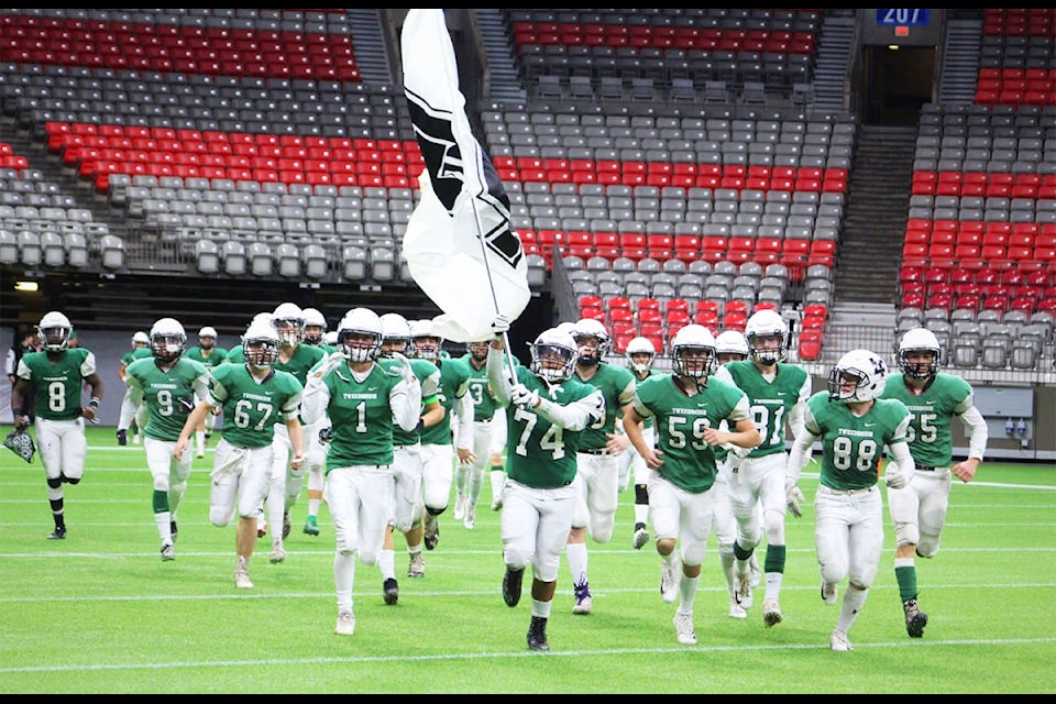 The Lord Tweedsmuir Panthers take the field to face the New West Hyacks Nov. 16 in a quarter-final playoff game at B.C. Place. The Panthers won the game 36-7, scoring 36 unanswered points, including two kickoff returns for TDs in the 3rd quarter. (Photo: Olivia Johnson)
