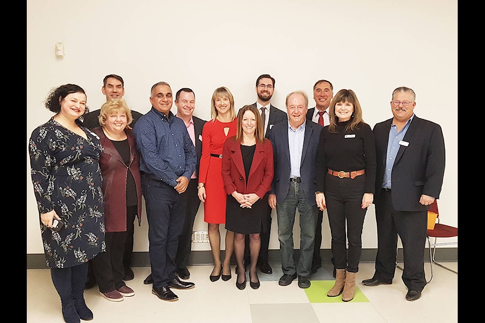 The Cloverdale District Chamber of Commerce executive team stands with Mayor Doug McCallum and city councillors Nov. 29 at the Cloverdale Rec. Centre. (Photo: Submitted)