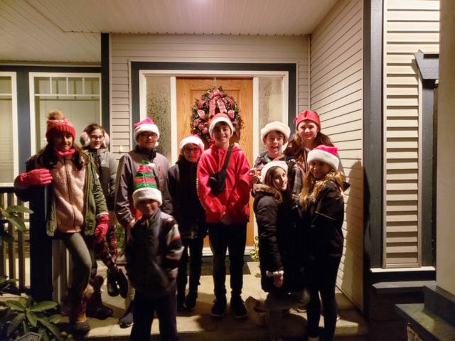 Clayton’s carolling kids took in two wagons full of food items for the Surrey Food Bank Dec. 13. (Photo submitted)
