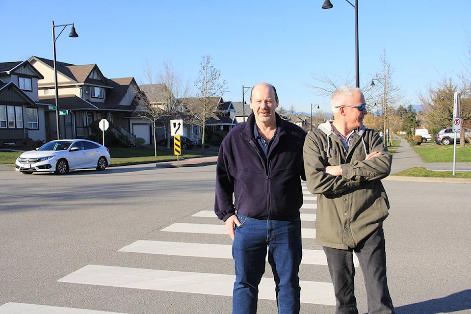 Walter van Halst (left) and his neighbour Rob Murray say cars hit incredibly high speeds along 63rd Avenue between 166th and 168th Streets in Cloverdale. (Photo Malin Jordan)