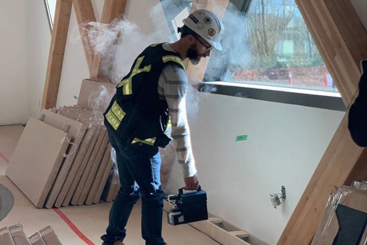 A worker completes an air tightness test at the Clayton Community Centre. Because of a budget shortfall, the City won’t be opening the centre until 2021. (Photo courtesy of HCMA Architecture + Design)