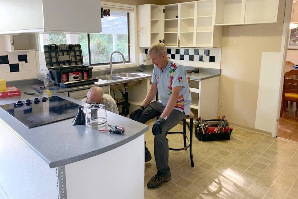 Chip Bowness (seated) and Brian O’Ruairc in the nearly-completed Stayte House kitchen. (Contributed photo)