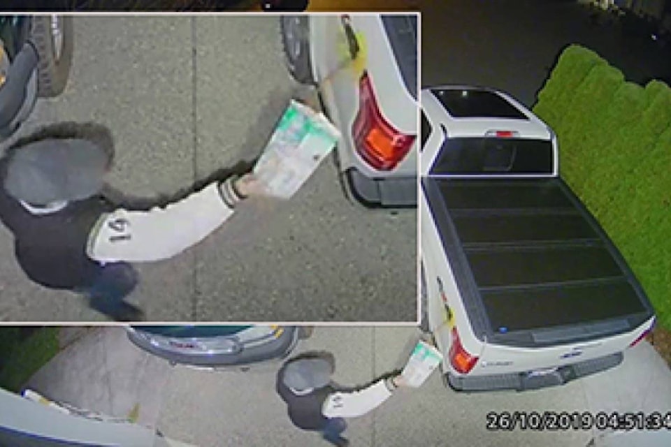 Surrey RCMP have released images in the hopes of identifying a man seen on security video damaging property in the 3800-block of 154 Street. (Contributed photo)