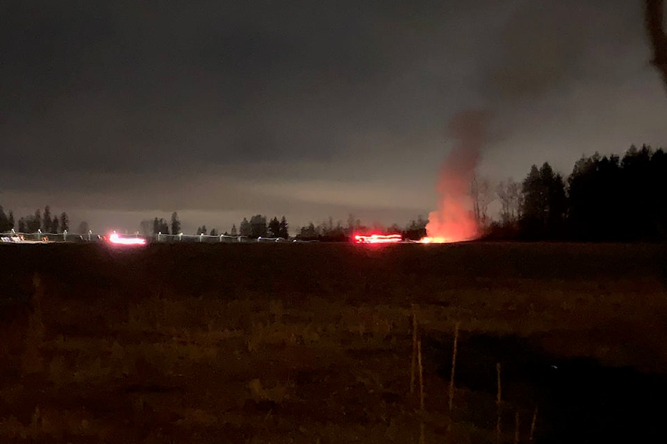 Surrey firefighters responded to a report of a shrub fire in the 3600-block of 192nd Street around 5 p.m. on Monday, Dec. 28, 2020, which turned out to be someone burning garbage. (Submitted photo)